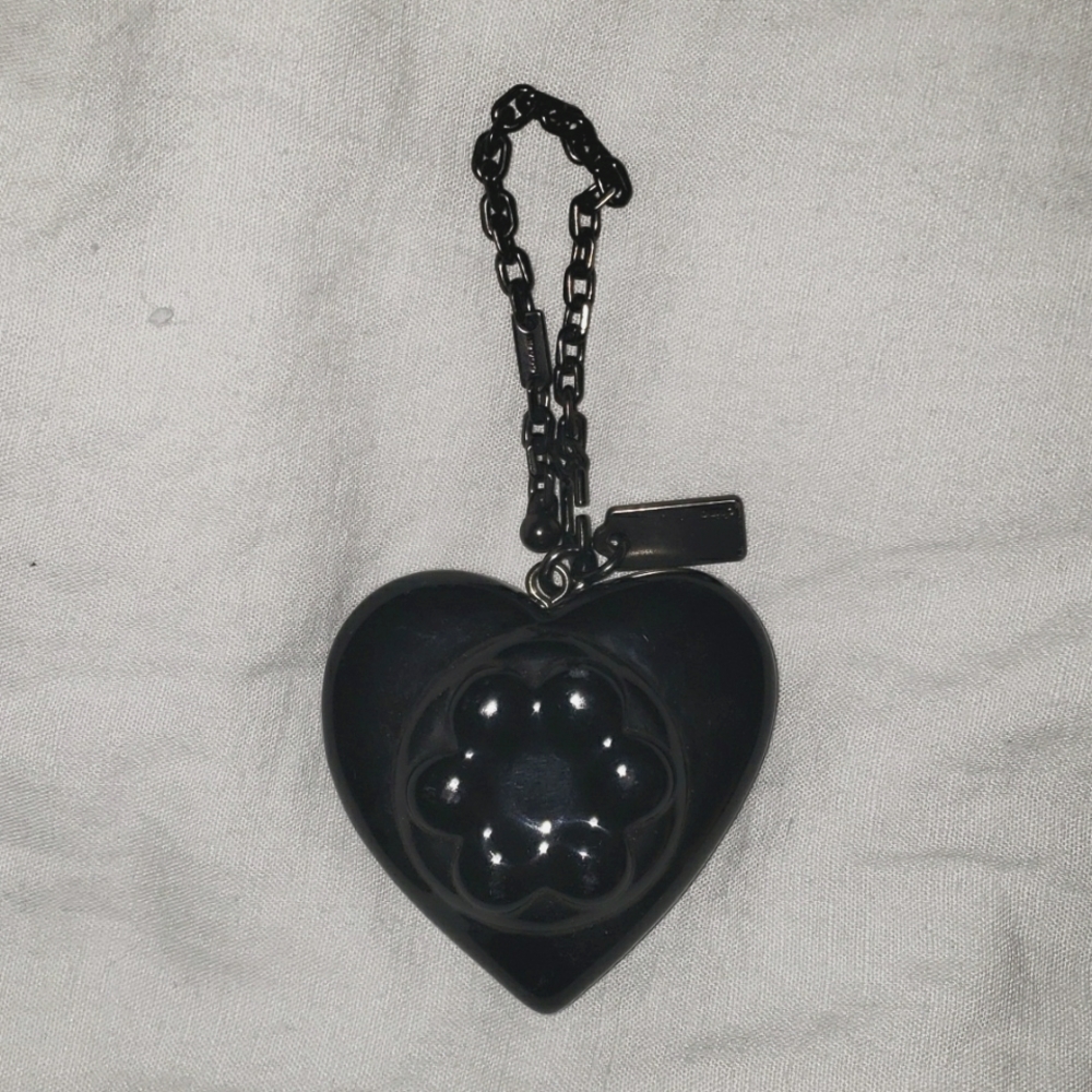 Coach purse charm in black